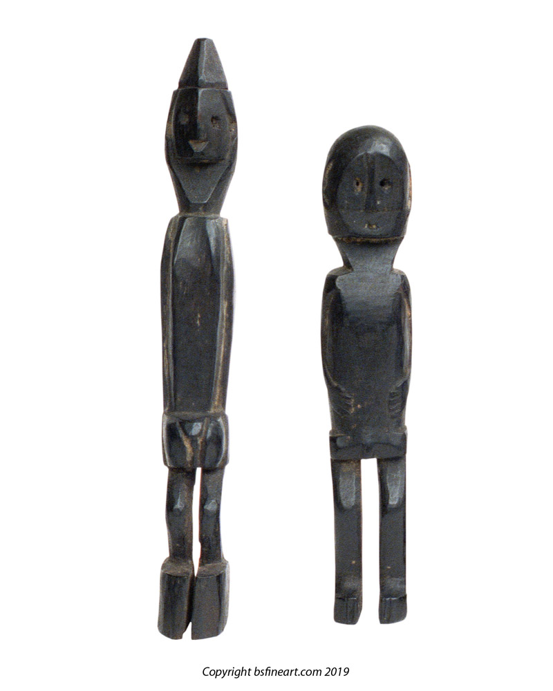 Two Dayak wooden charms